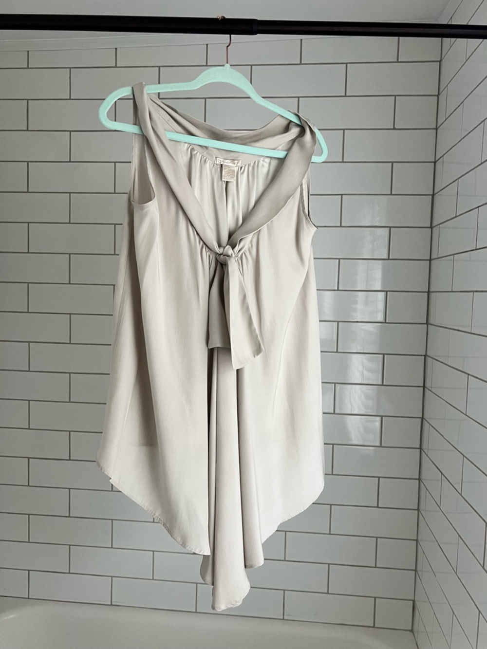 Gold Hawk | 100% Silk Sleeveless Tie-Front Blouse in Light Beige